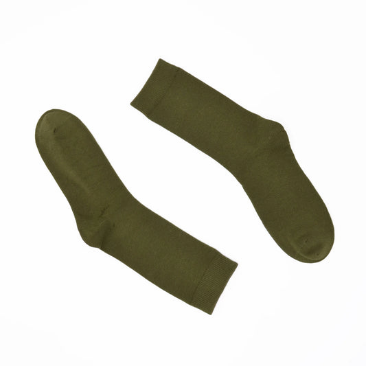 Pair of green socks on a white background