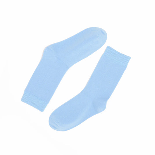 Pair of light blue socks on a white background