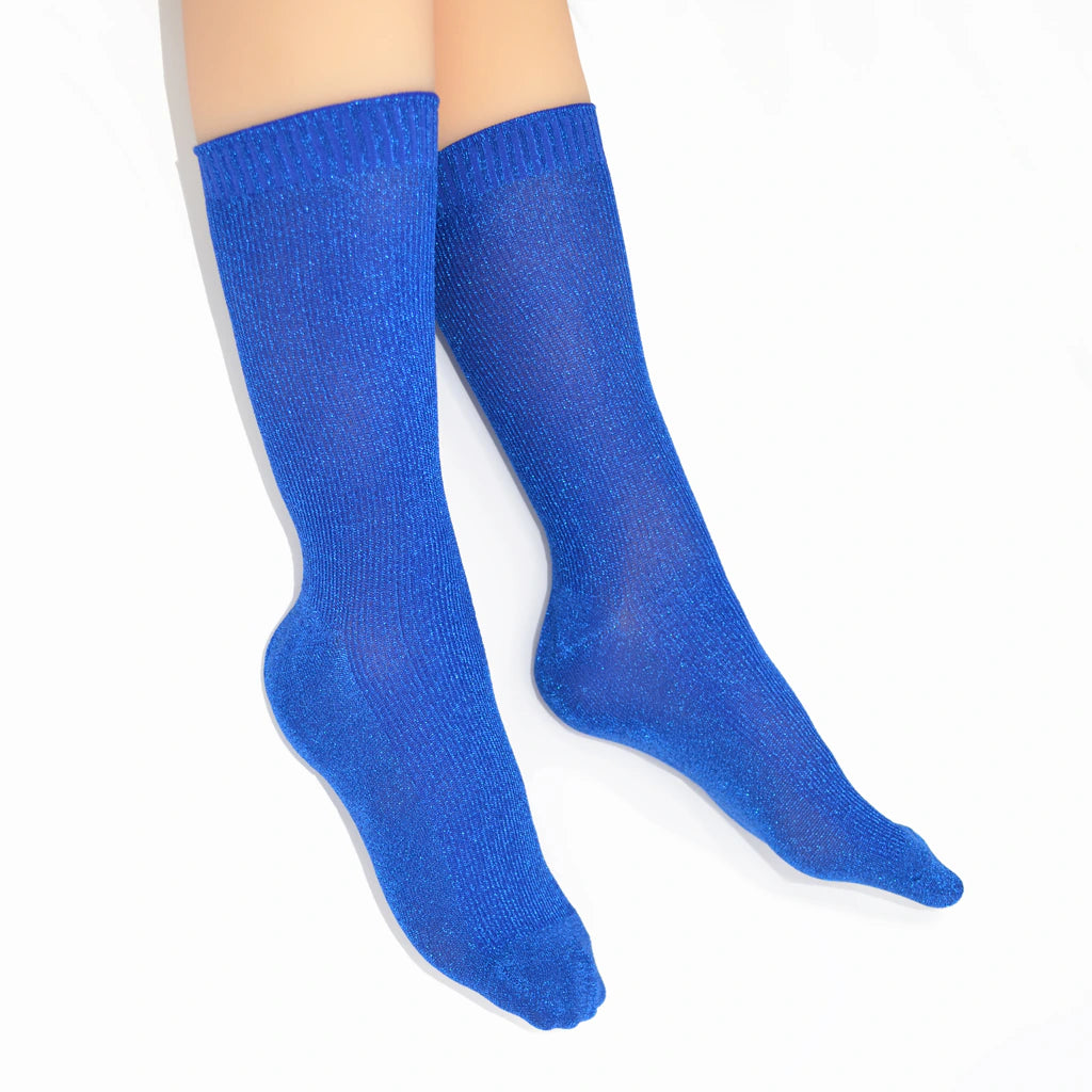 Blue crew socks on a white background