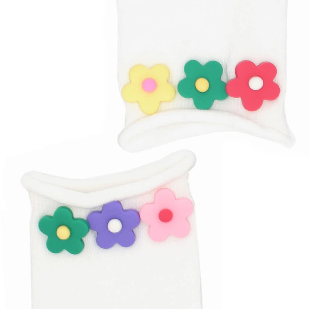 White socks with colorful flower designs on a white background