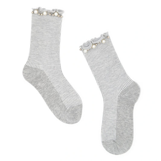 Pair of gray socks with pearl embellishment on a white background