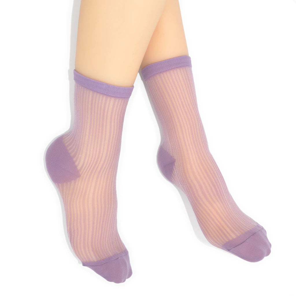 Sheer socks with purple accents on a white background