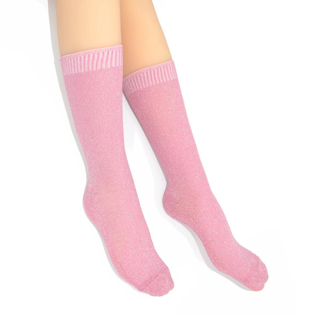 Pink crew socks on a white background