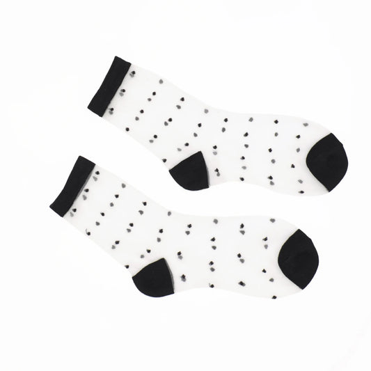 A pair of sheer socks with small black polka dots, black cuffs, and black heels, displayed on a clean white background.