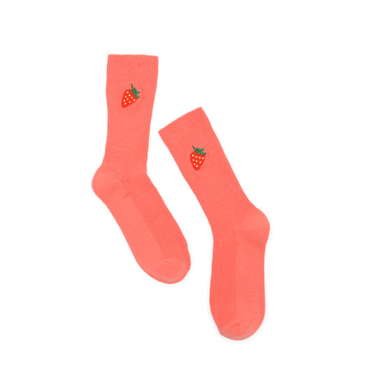 Pair of coral socks with strawberry design on a white background