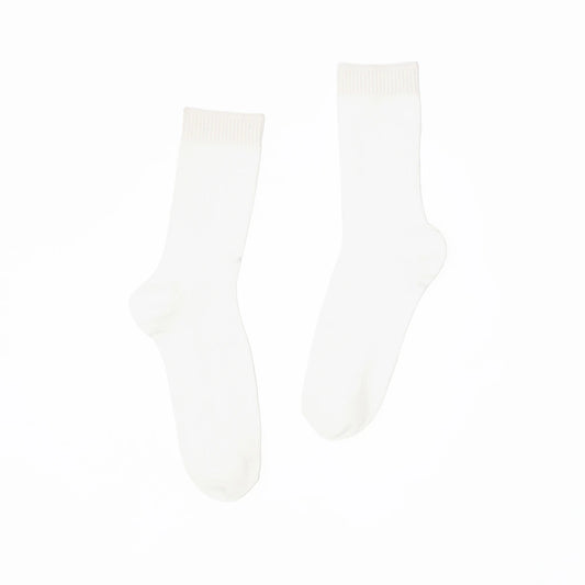 A pair of white socks on a white background