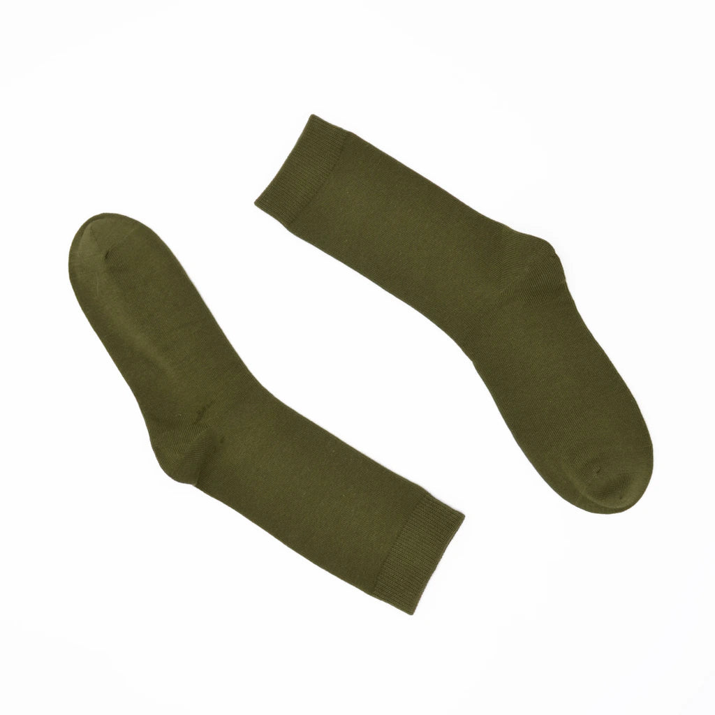 Pair of green socks on a white background