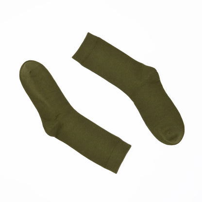 Pair of green socks on a white background