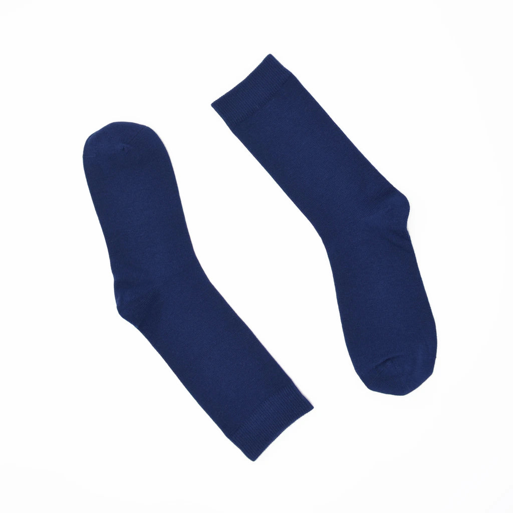 Pair of blue socks on a white background