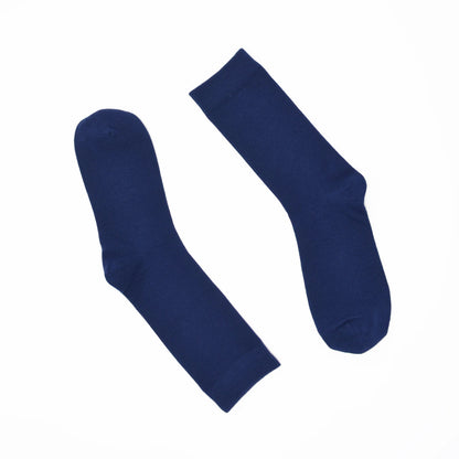 Pair of blue socks on a white background