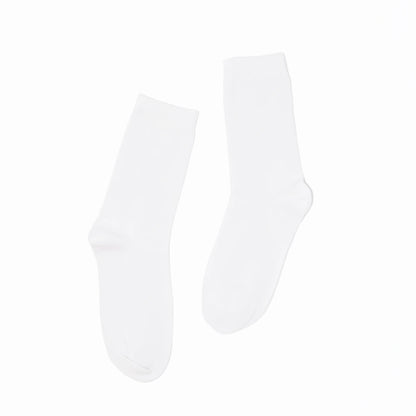 Two white socks on a white background