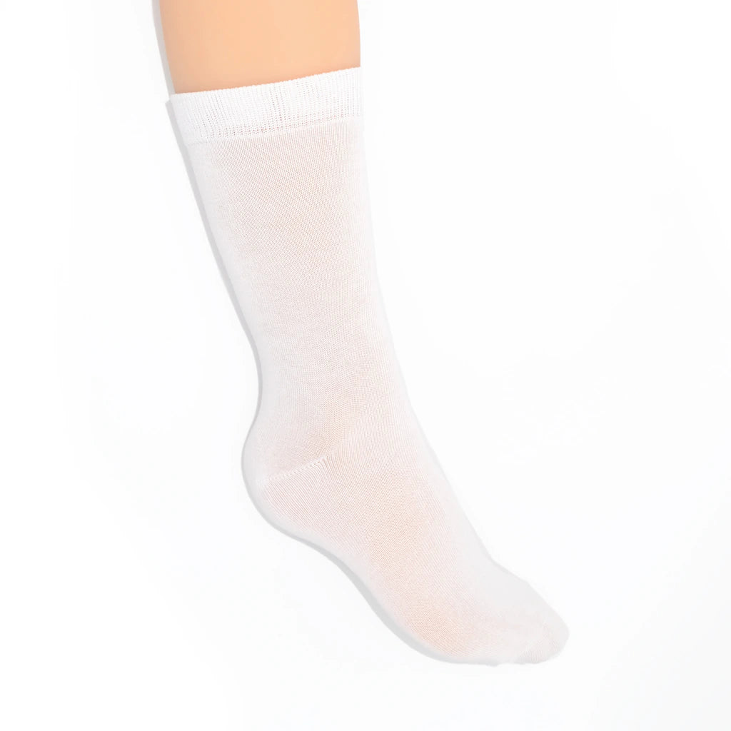 Leg modelling white socks on a white background