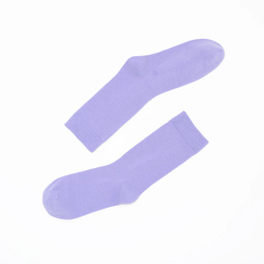 Pair of light purple socks on a white background