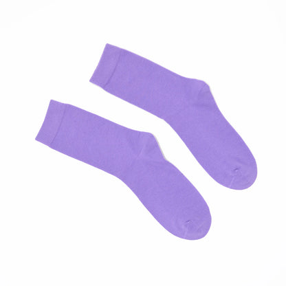 Pair of lavender socks on a white background