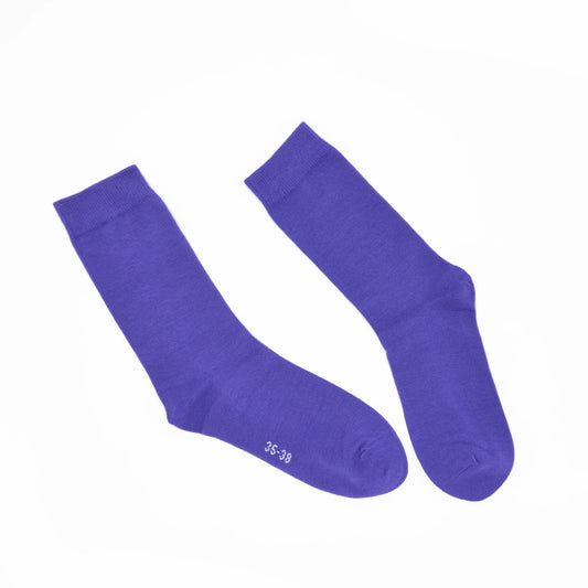 Pair of purple socks on a white background