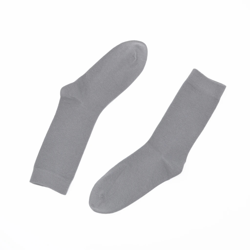 Pair of gray socks on a white background