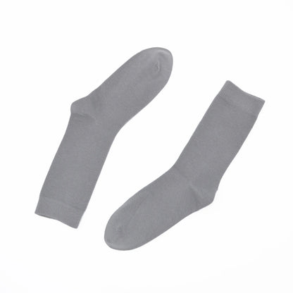 Pair of gray socks on a white background