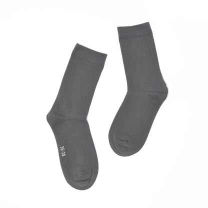 Pair of gray socks on a white background