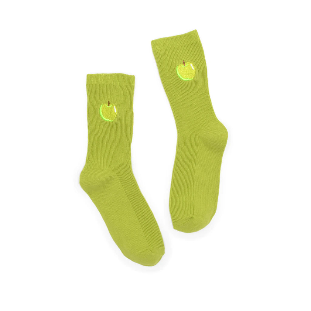 Pair of green socks with a small yellow graphic on a white background
