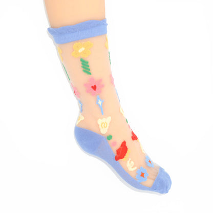 Transparent socks with colorful patterns on a white background