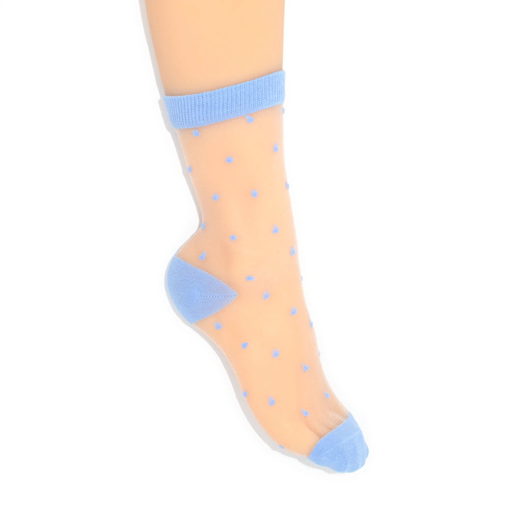 Sheer socks with blue polka dots and cuffs on a white background