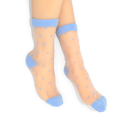 Sheer socks with blue polka dots and cuffs on a white background