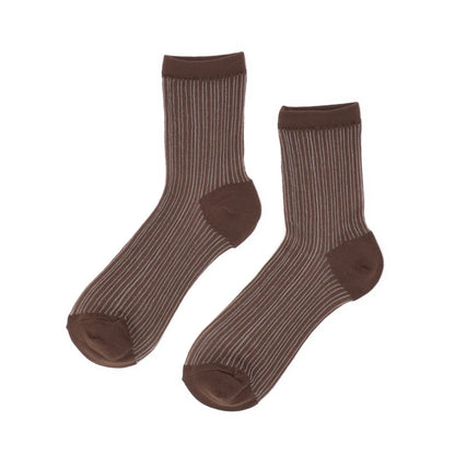 Pair of brown socks with striped pattern on a white background