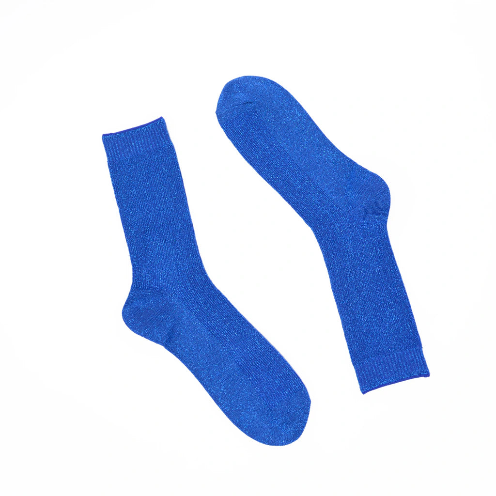Pair of blue socks on a white background