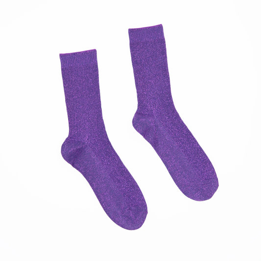 Pair of purple socks on a white background