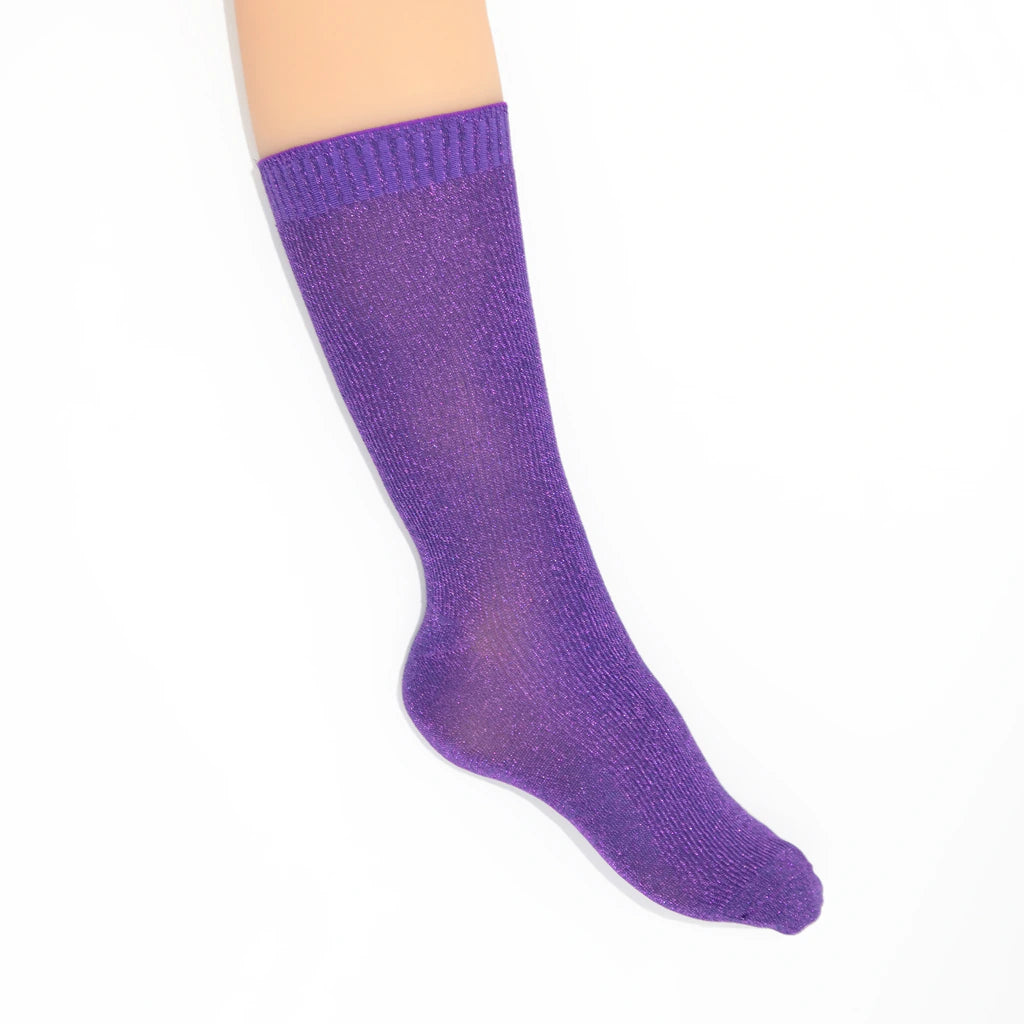Purple sock against a white background