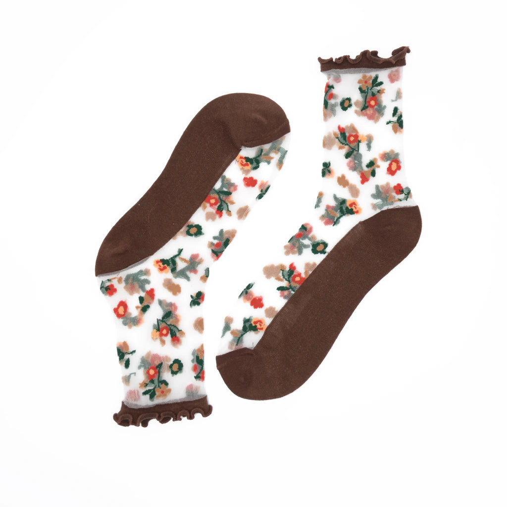 Floral-patterned socks with brown accents on a white background