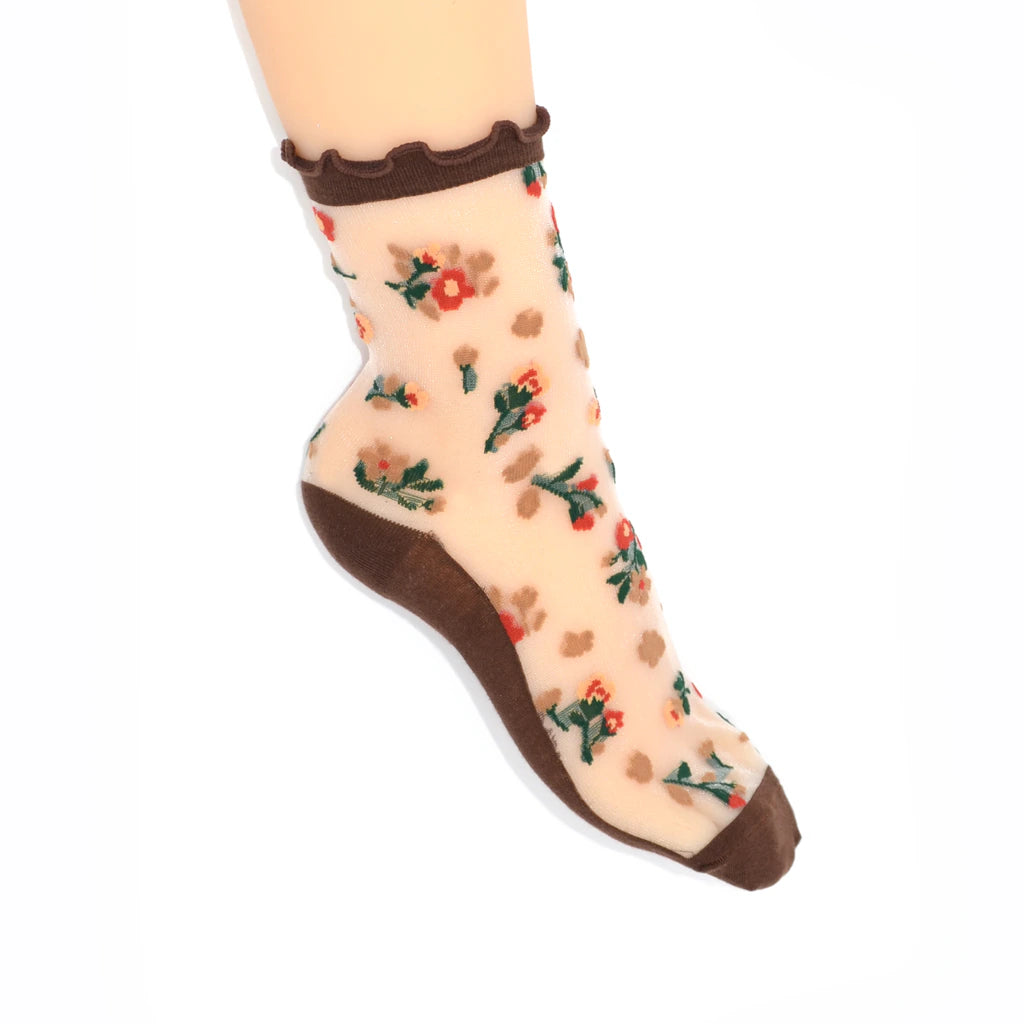 Sheer socks with floral pattern and brown accents on a white background