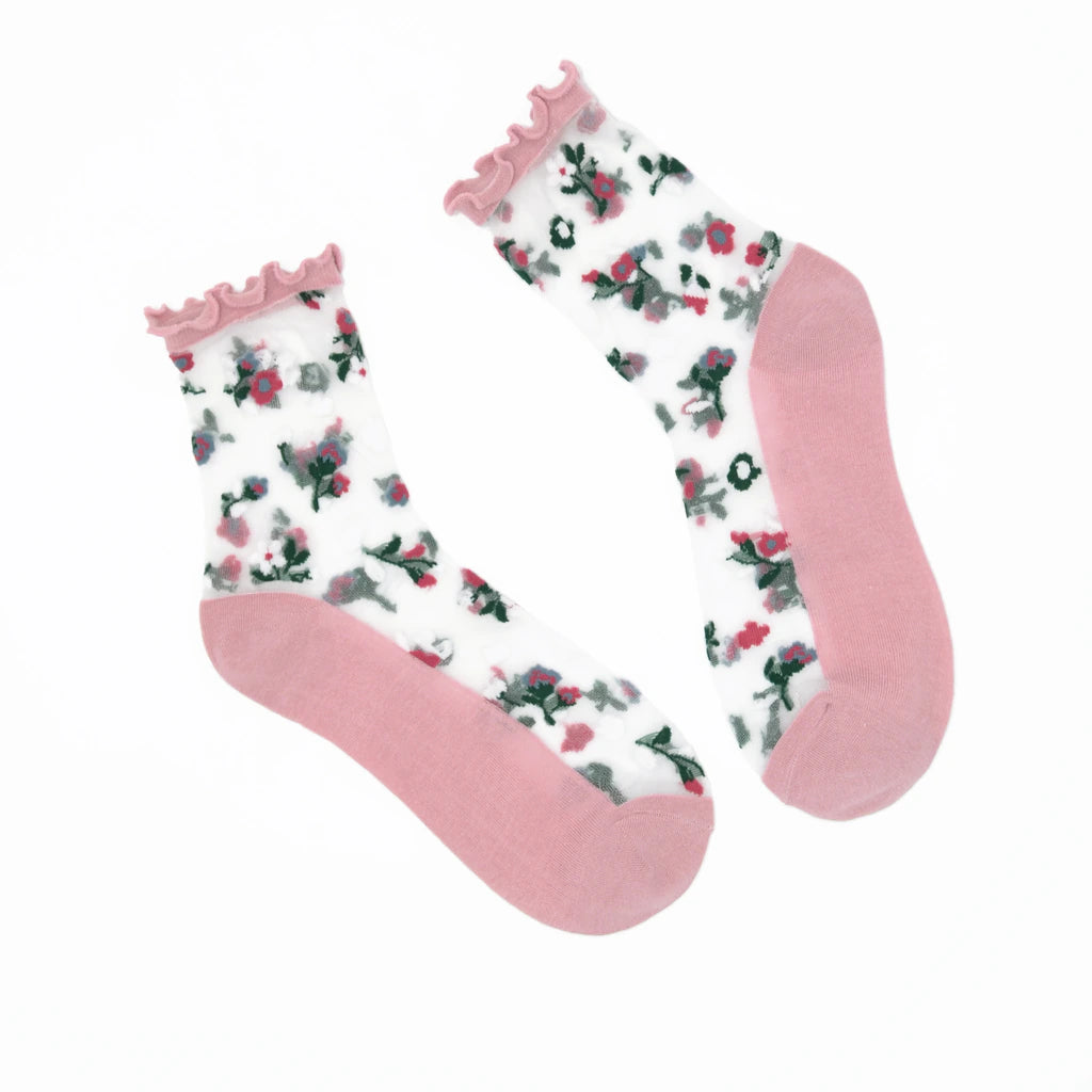 Pair of socks with floral pattern and pink accents on a white background