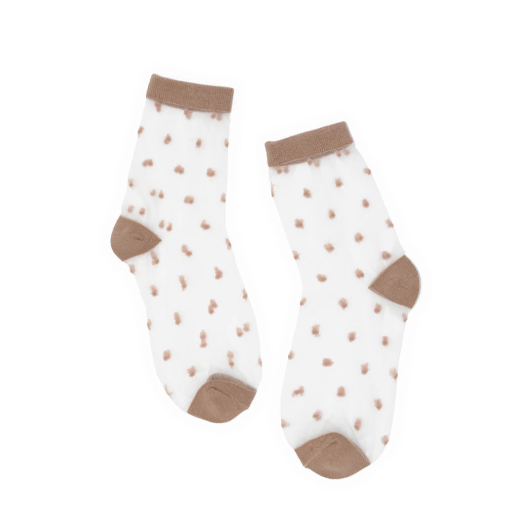 Pair of socks with brown polka dots and cuffs on a white background