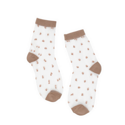Pair of socks with brown polka dots and cuffs on a white background