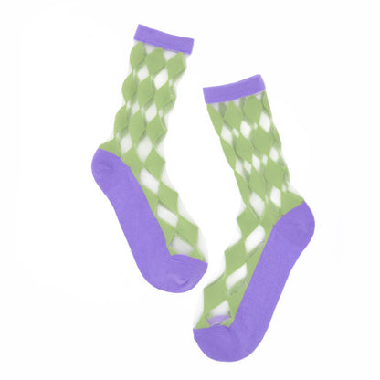 Green and purple patterned socks on a white background