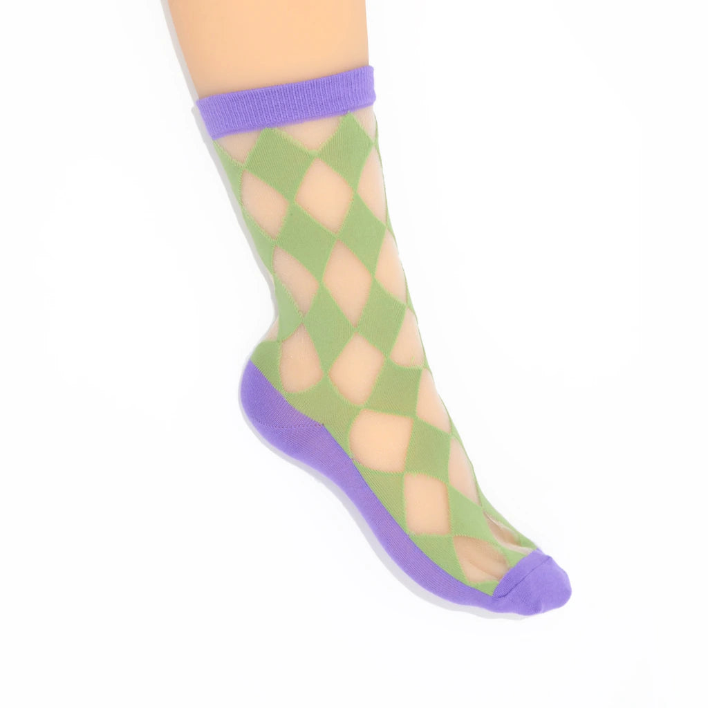Green and purple patterned socks on a white background