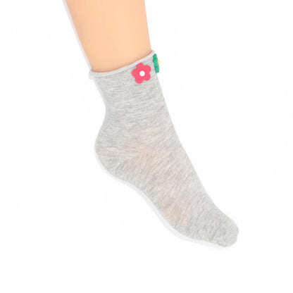 Pair of gray socks with colorful flower decorations on a white background