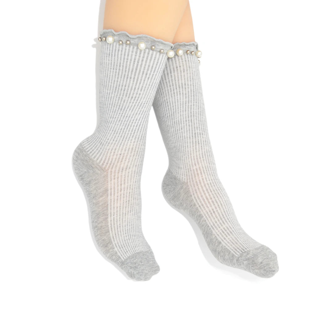 Gray socks with pearl embellishments on a white background