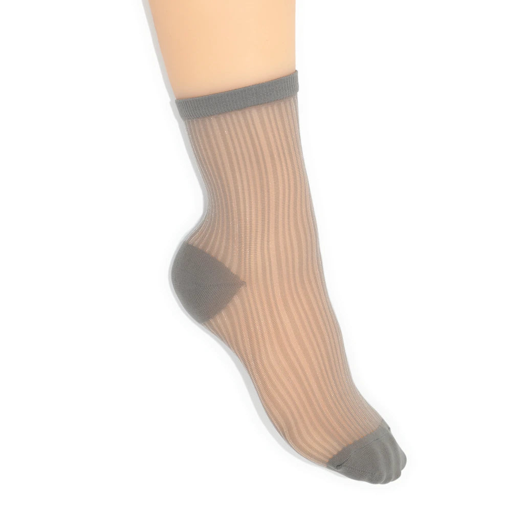 Sheer grey sock with gray trim against a white background