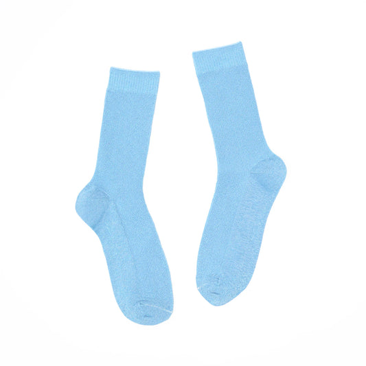 Pair of light blue socks on a white background