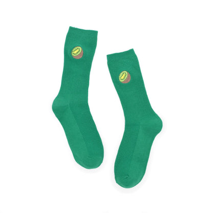 Green socks with a kiwi on a white background