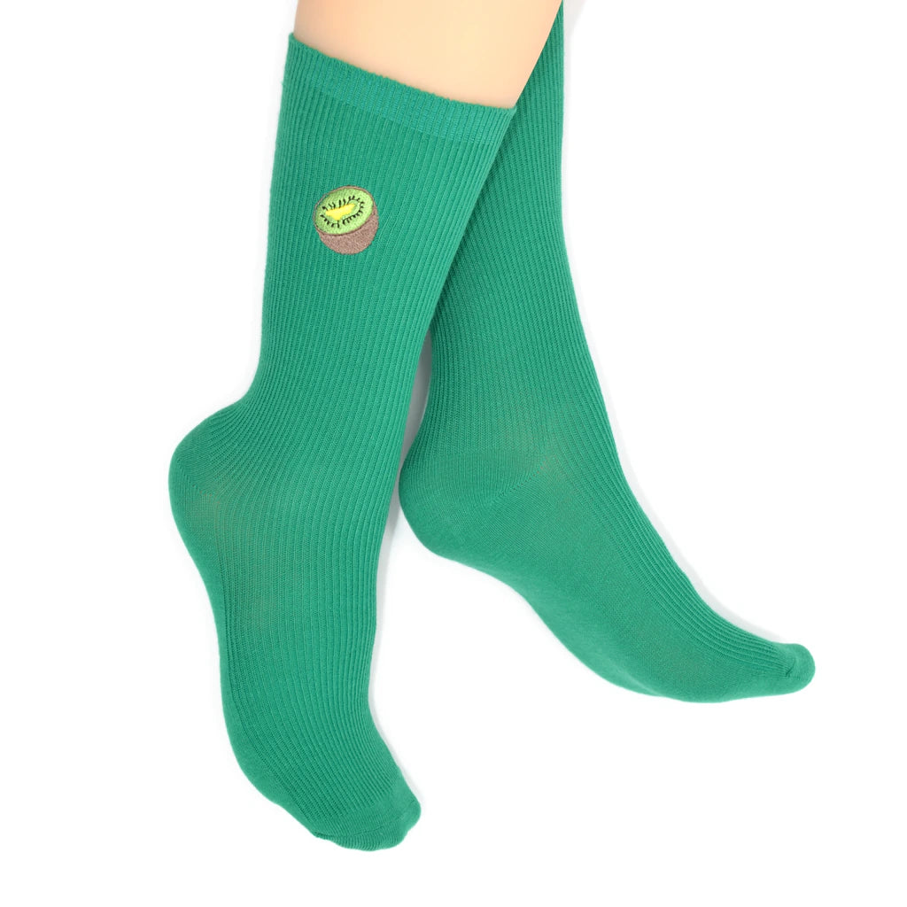 Green socks with a kiwi on a white background
