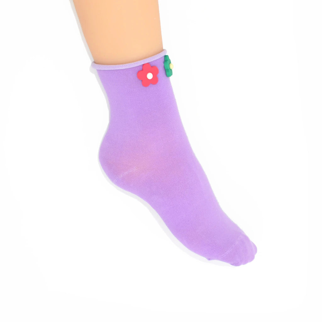 Purple ankle sock with floral design on a white background