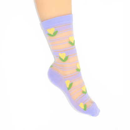 Sock with yellow heart pattern on a white background