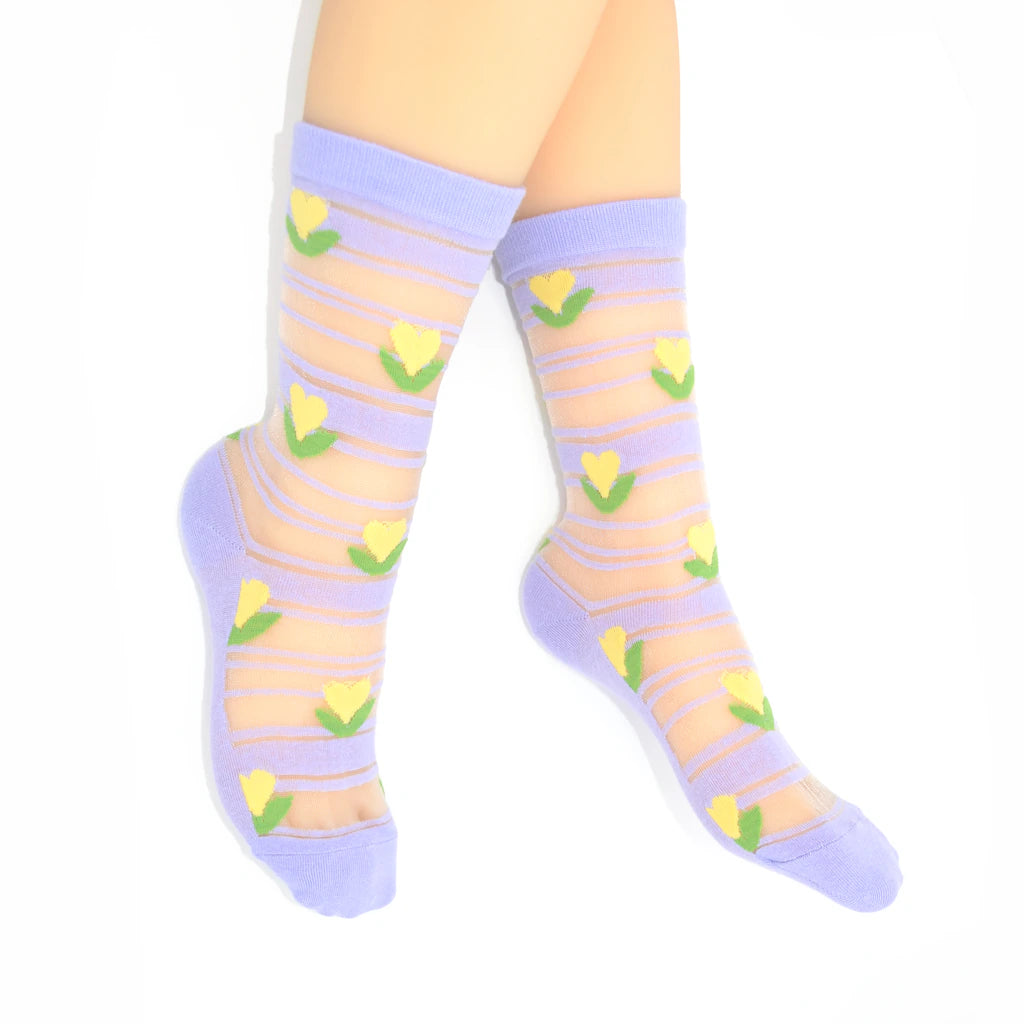Colorful striped socks with tulip patterns on a white background