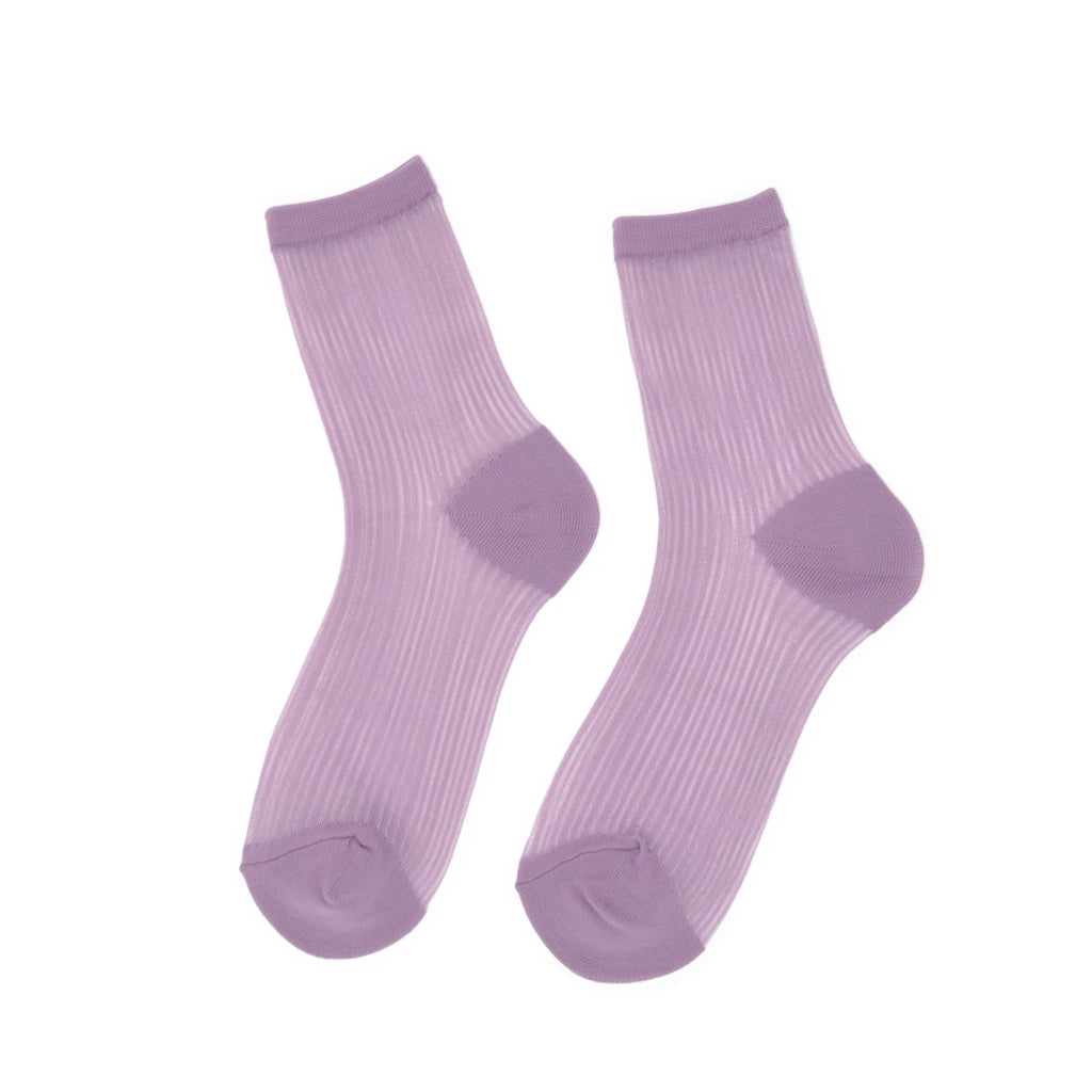 Pair of purple socks on a white background