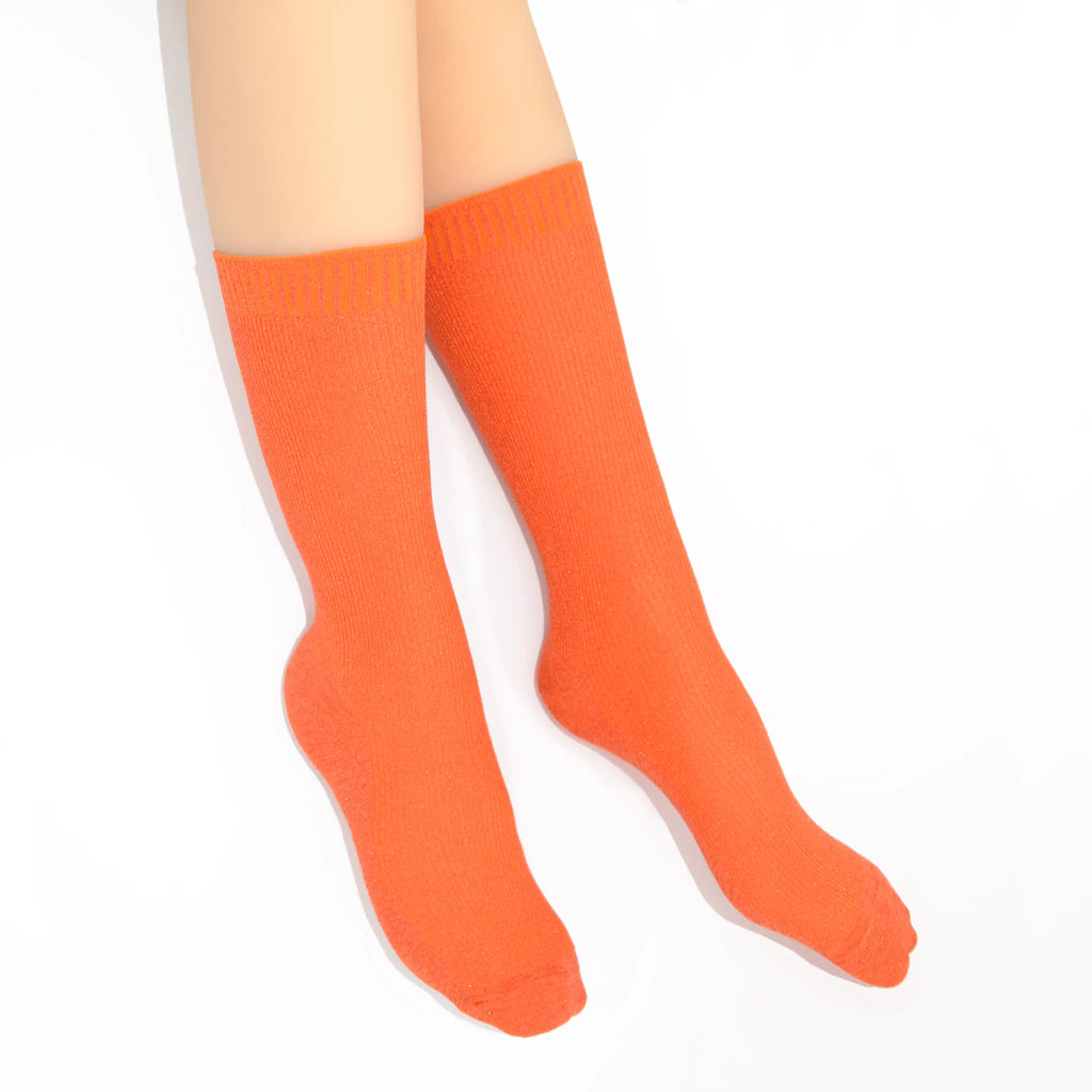 Orange sock on a white background