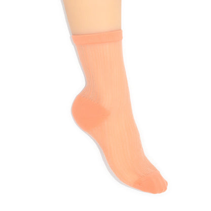 Peach-colored sock on a white background