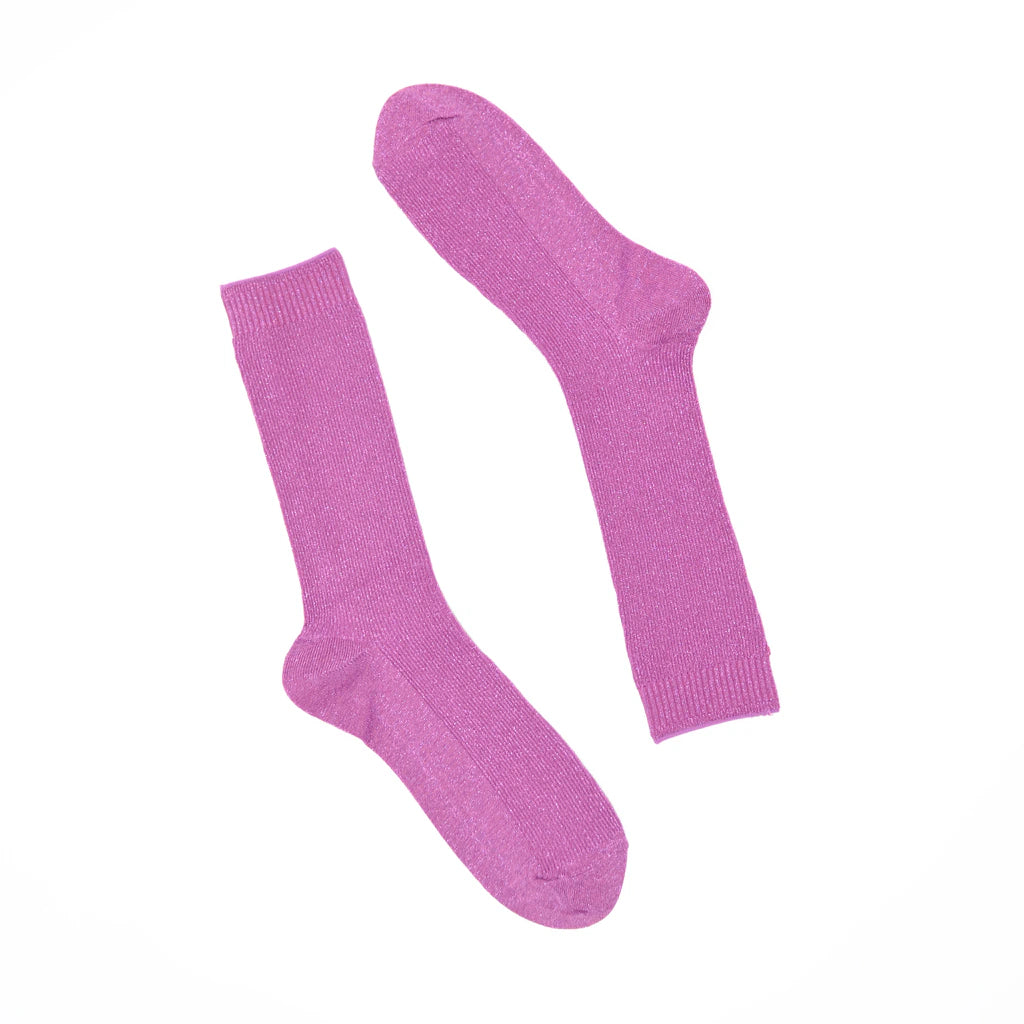Pair of pink socks on a white background